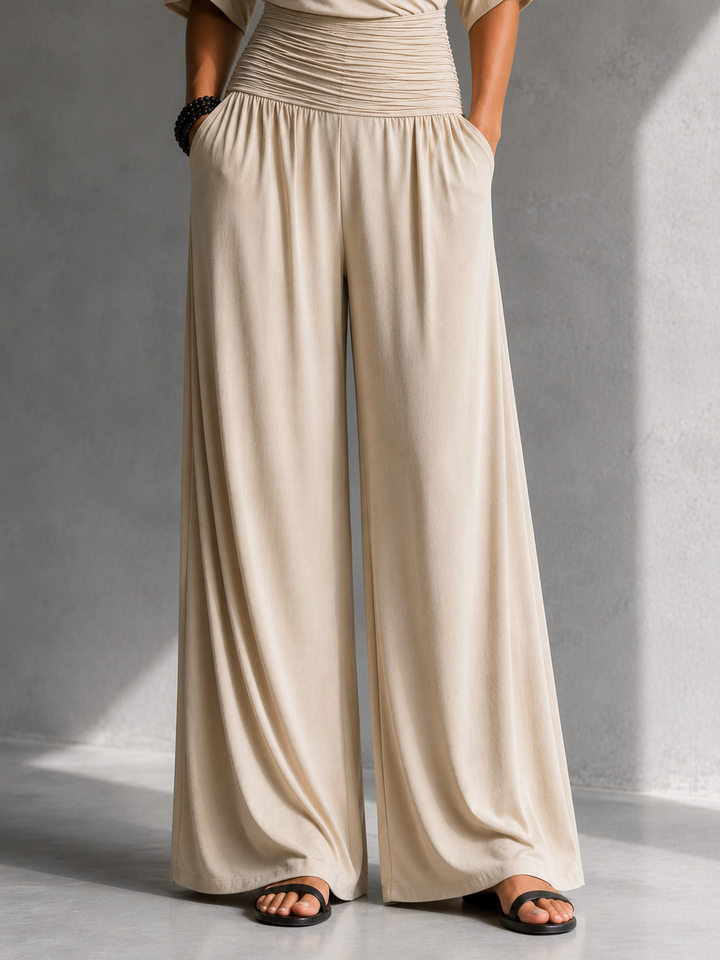 Romina Tuta Elegante con Spalle Aperte