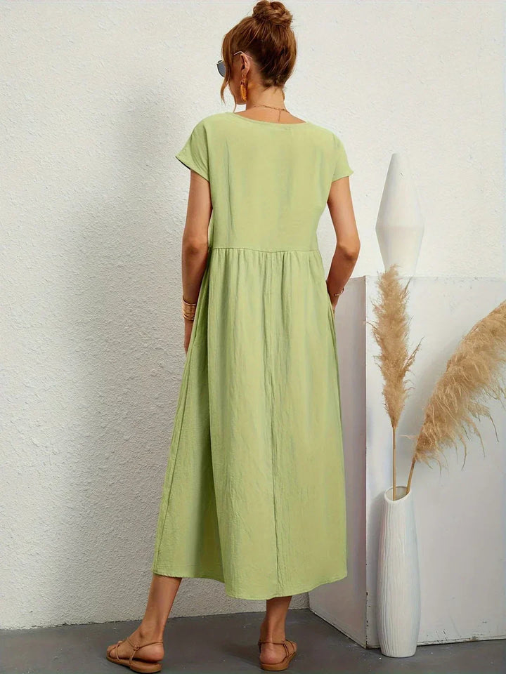 Amélie™ — Abito midi fluido dall’eleganza senza tempo
